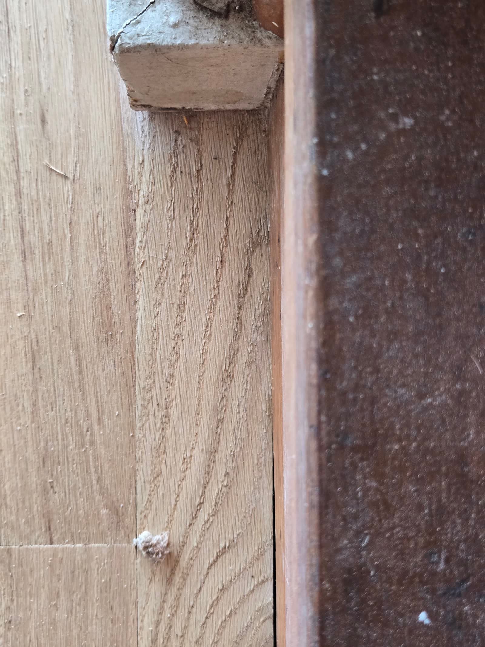 Sep 22: raw board end tight to the door jamb.